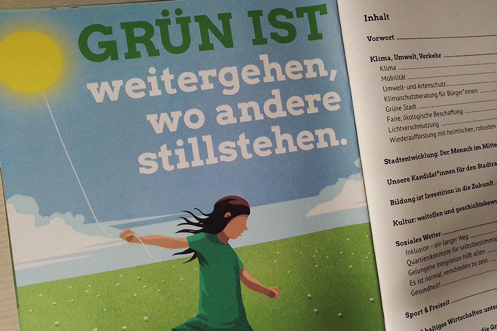 Bild von einem alen Wahlprogramm Ein Mädchen das als Luftballon die Sonne in den Händen hält